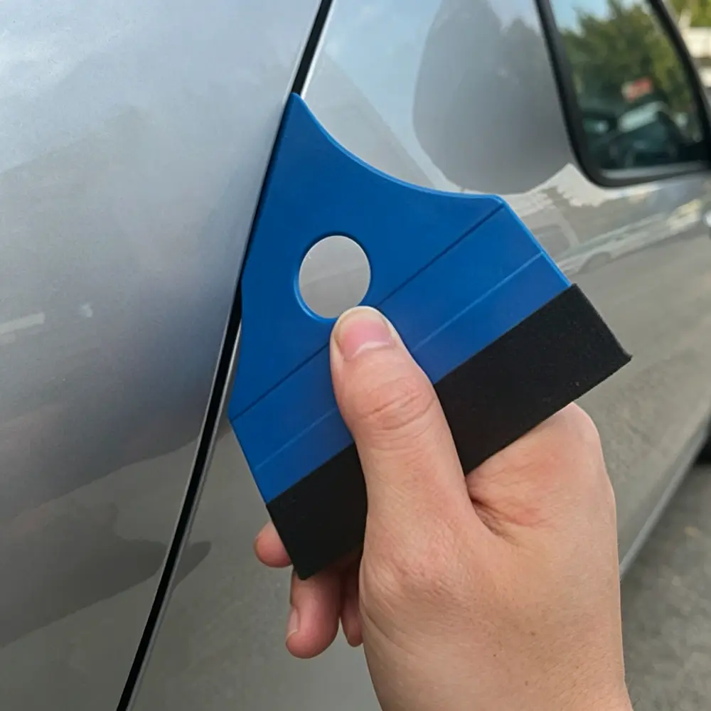 wallpaper installation smoothing squeegee